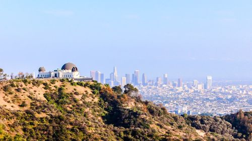 Buildings against clear sky