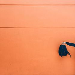 Midsection of woman against blurred background