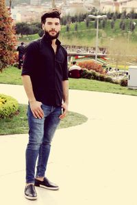 Portrait of young man standing outdoors