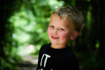 Portrait of cute boy smiling