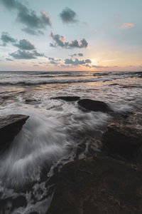 Scenic view of sea against sky during sunset