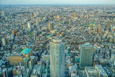 High angle view of modern buildings in city