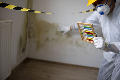 Midsection of man working at home