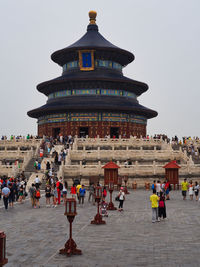 Group of people in front of building