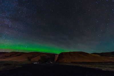 Scenic view of star field against sky at night