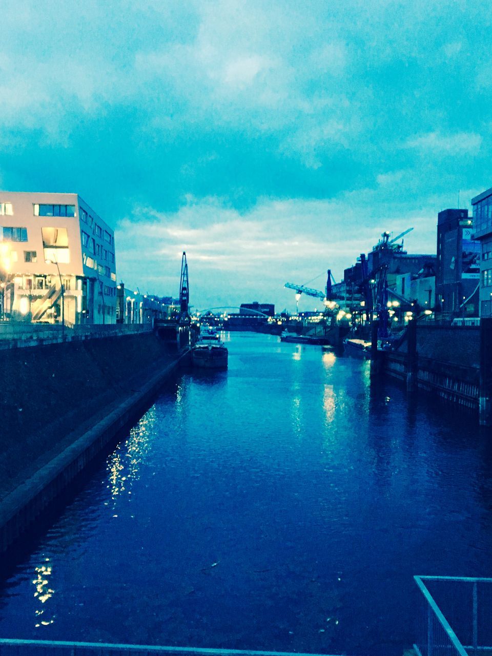 REFLECTION OF CITY IN WATER