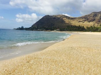 Scenic view of beach against sky