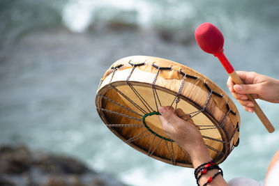  people are seen playing percussion instruments during a party for iemanja on rio vermelho beach
