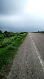 Road passing through field