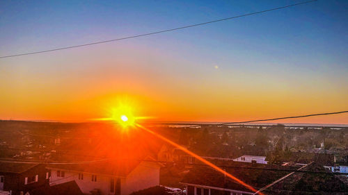 High angle view of townscape against sky during sunset