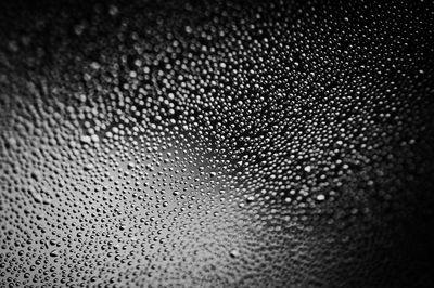 Full frame shot of wet glass