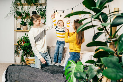 Cheerful family enjoying at home