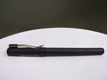 High angle view of container on table against black background