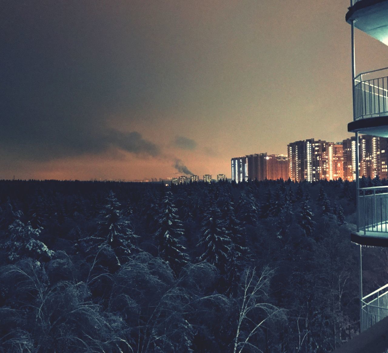 BUILDINGS AGAINST SKY DURING SUNSET