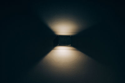 Directly below shot of illuminated light on wall