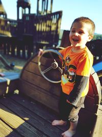 Cute boy standing outdoors