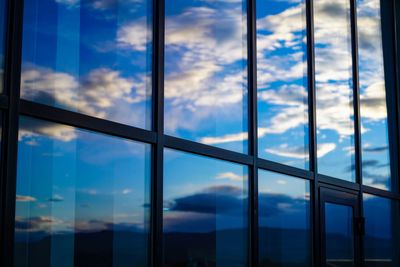 Reflection of sky on glass window