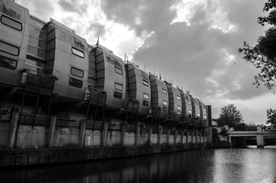 View of buildings against cloudy sky