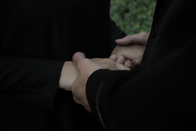 Close-up of hands on woman