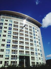 Low angle view of building against blue sky