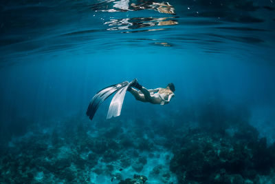 Man swimming in sea