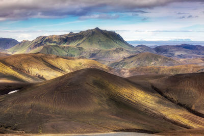 Scenic view of volcanic mountain against sky