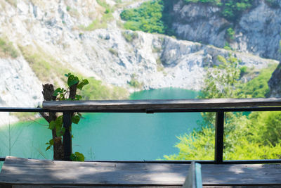 Scenic view of waterfall against mountains