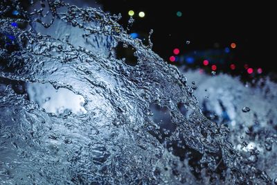 Close-up of illuminated water in winter