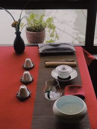 Close-up of tea cups on table