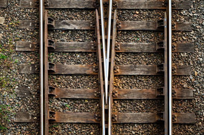 Railway tracks and switches for train traffic, closeup, top down view