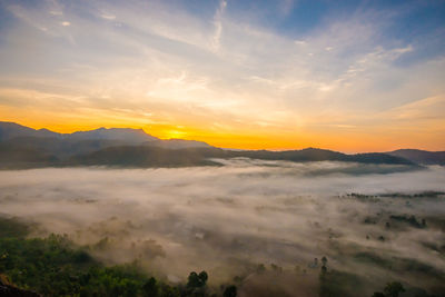 Scenic view of mountains against sky during sunset