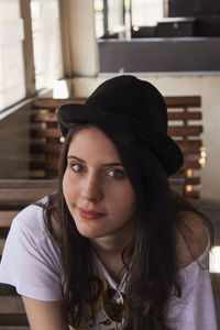 Portrait of young woman looking away