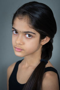 Close-up of young woman at home