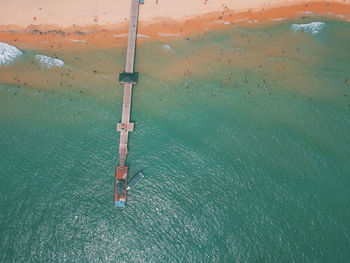 High angle view of pole by sea
