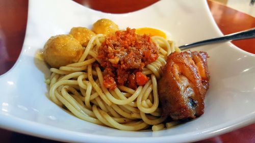 Close-up of noodles served in plate