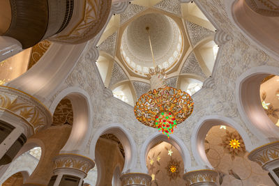 Low angle view of ornate ceiling in building