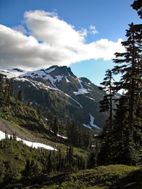 Scenic view of mountains against sky during winter