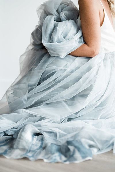 MIDSECTION OF A WOMAN SLEEPING ON BED