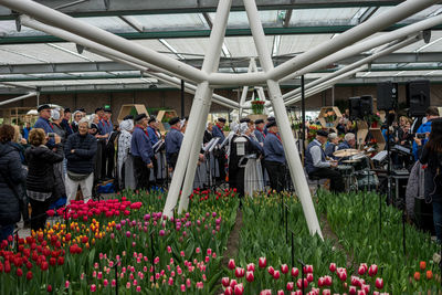 Group of people on flowering plants