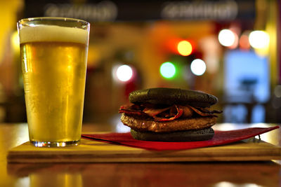 Close-up of beer glass on table