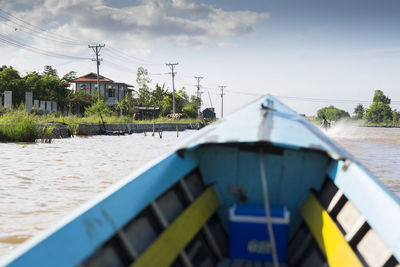 Built structure by lake against the sky on lake inle, myanmar