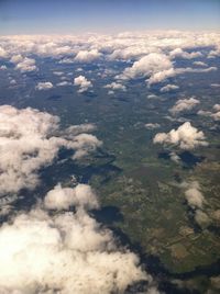 Aerial view of landscape against cloudy sky