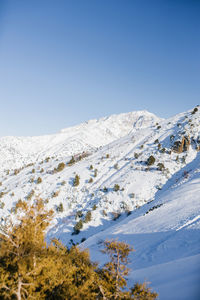 Mountain peaks covered with snow in uzbekistan on a clear day. beldersay ski resort