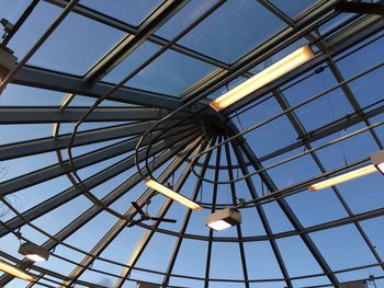 Low angle view of ceiling against blue sky