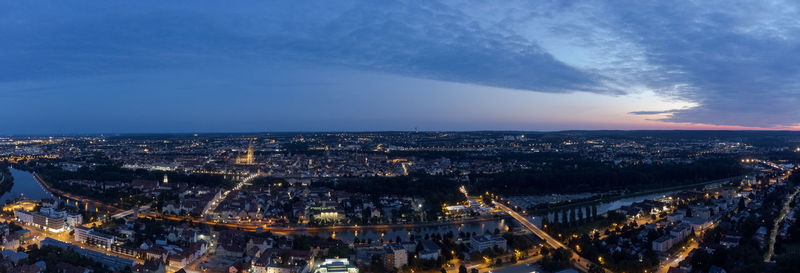 High angle view of illuminated buildings in city