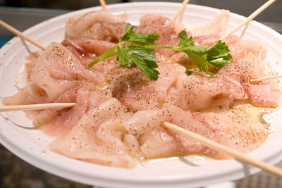 High angle view of meat in plate on table