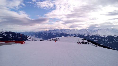 Scenic view of snowcapped mountains against sky