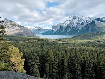 Scenic view of mountains against cloudy sky