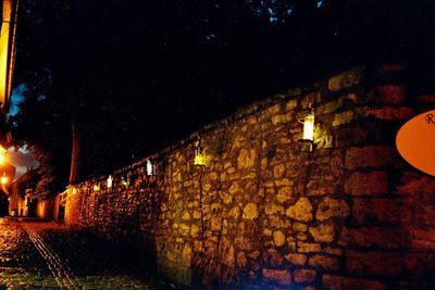 Illuminated street light at night