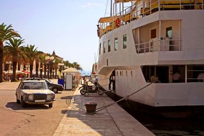 Vintage appearing image of ship and car in the port of split